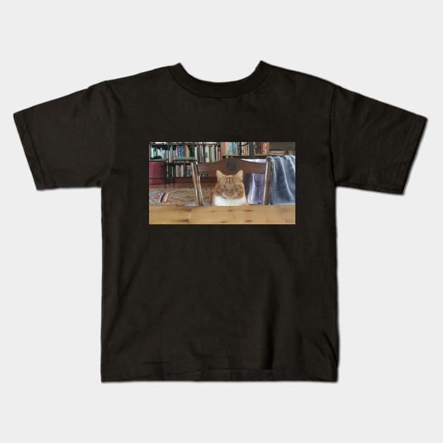 A cute cat in a library Kids T-Shirt by BTSKingdom